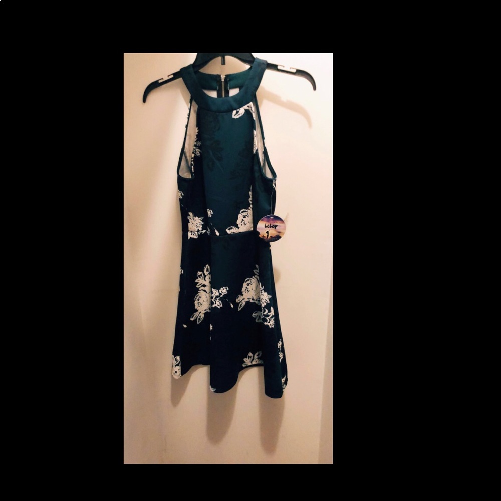 Dark green dress with lace flowers